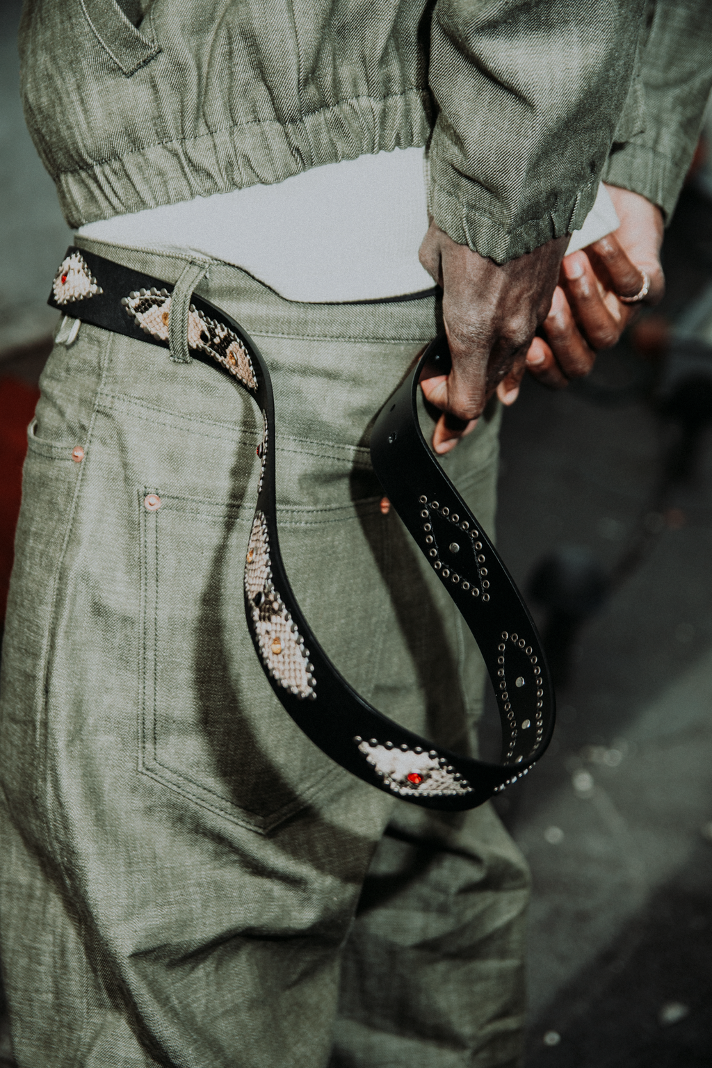 Studded snakeskin belt