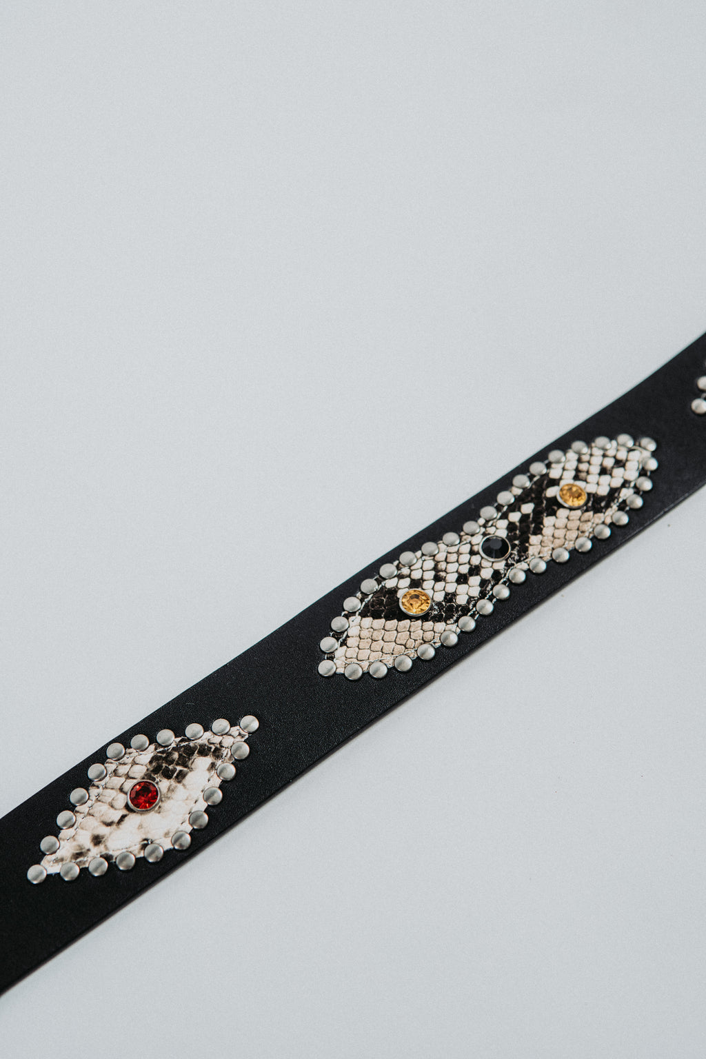 Studded snakeskin belt