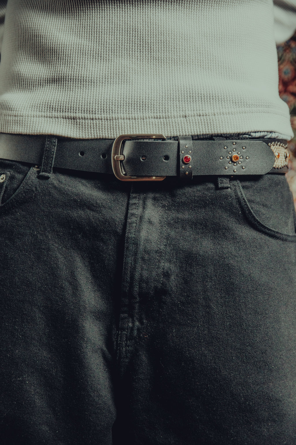 Studded snakeskin belt