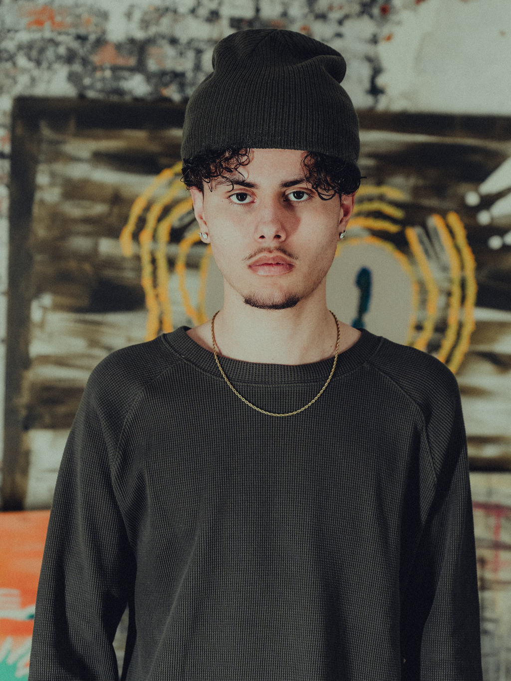 army green ribbed beanie front view on model