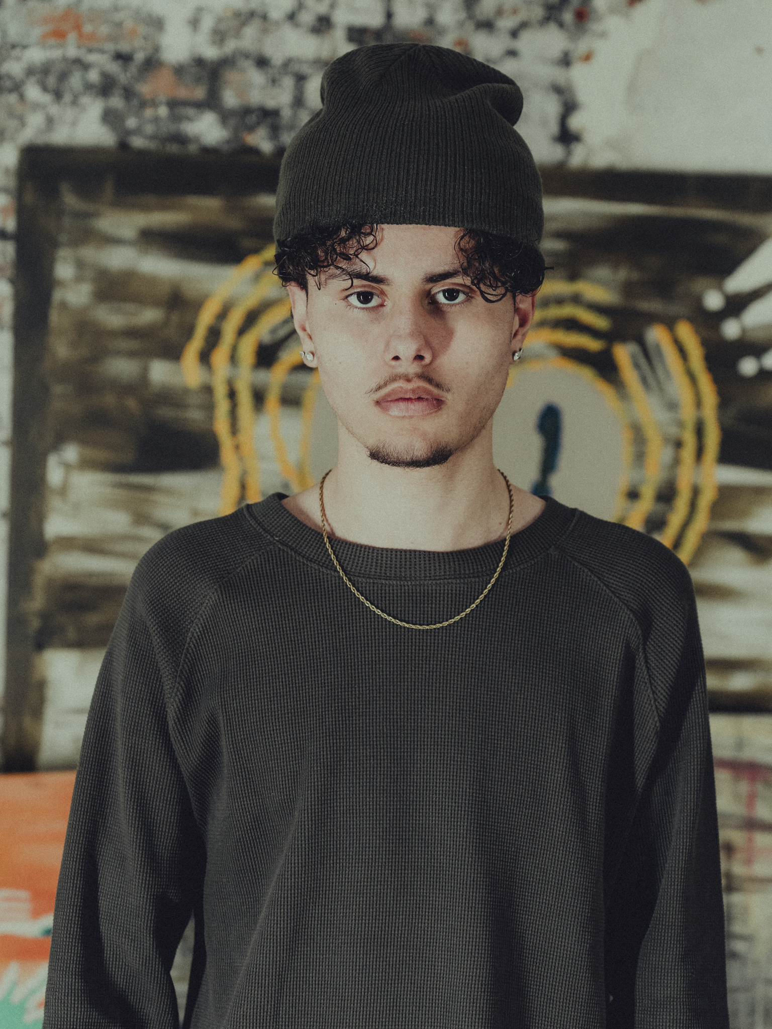 army green ribbed beanie front view on model