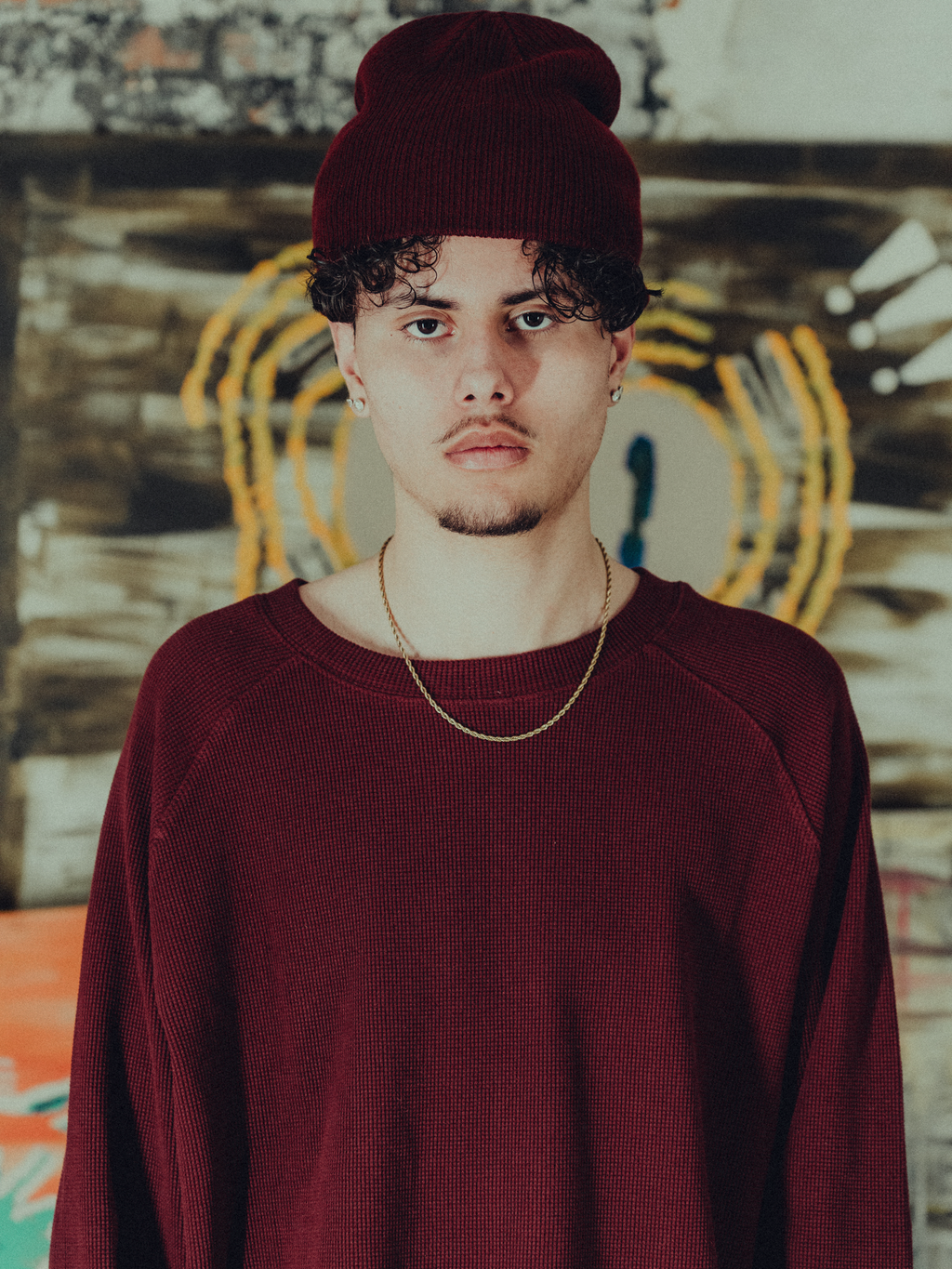 burgundy ribbed beanie front view on model