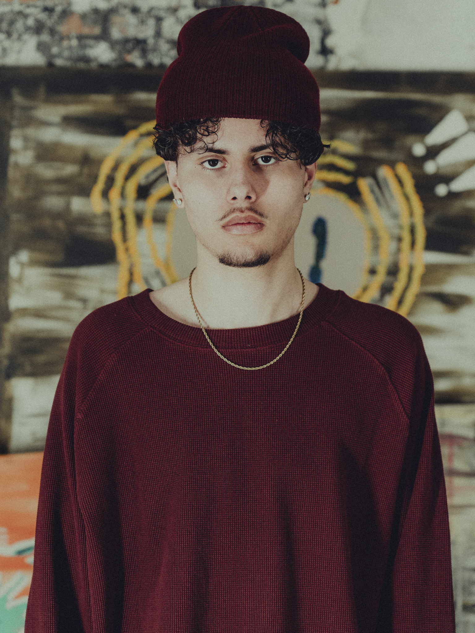 burgundy ribbed beanie front view on model
