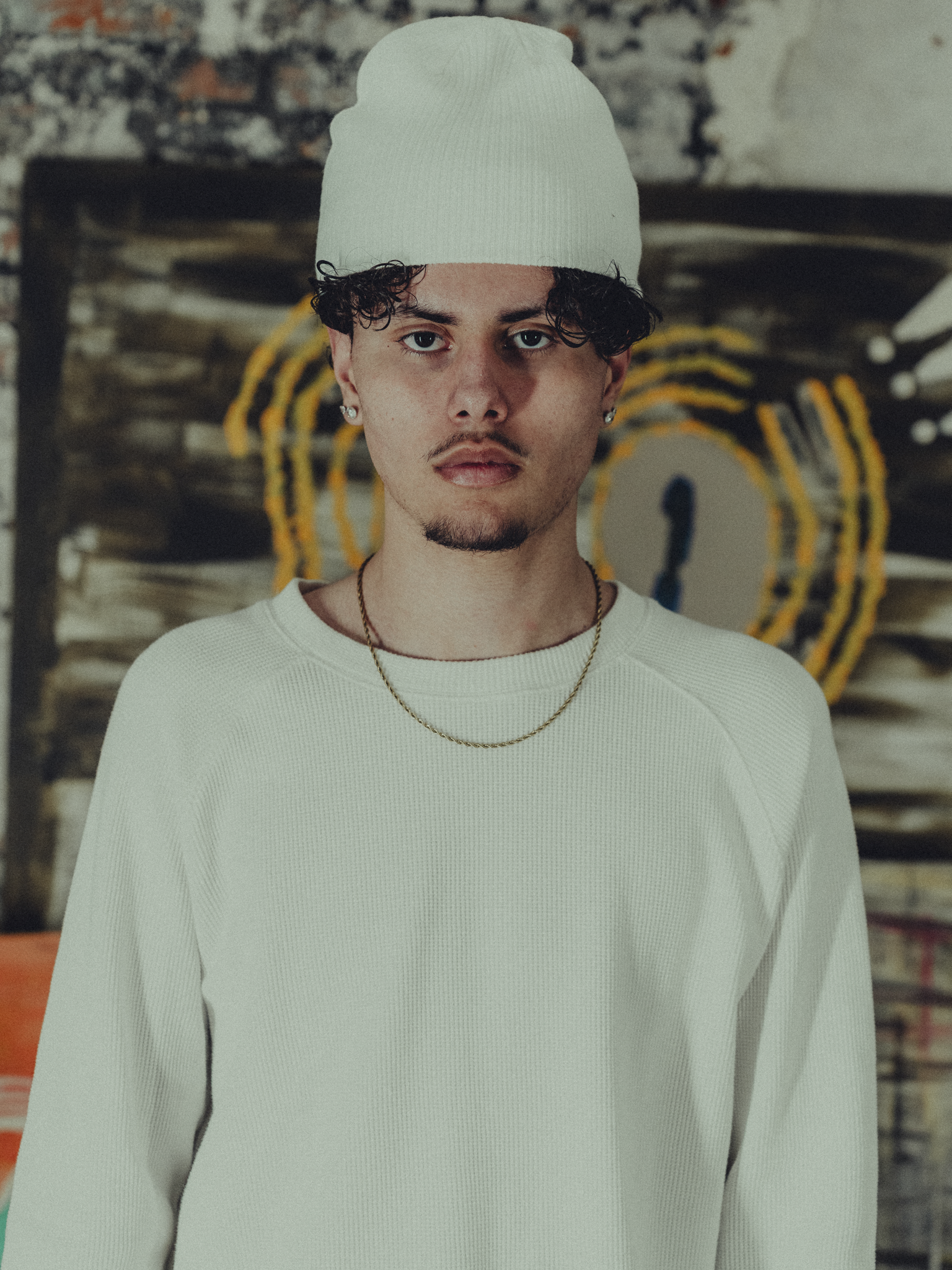white ribbed beanie front view on model